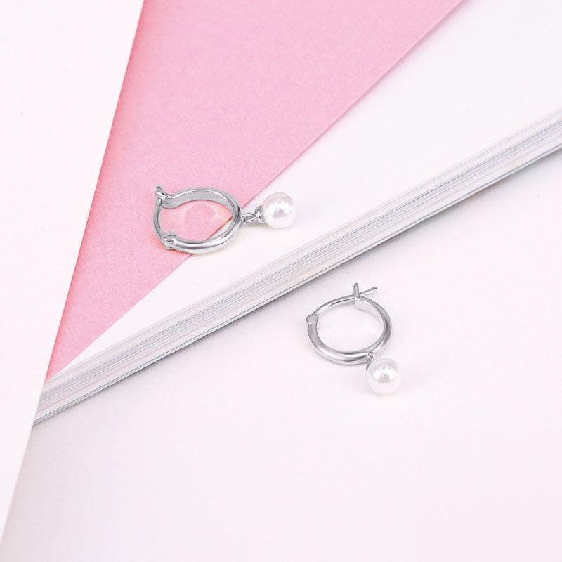 Pearl Dangling Huggie Earrings by Silphina
