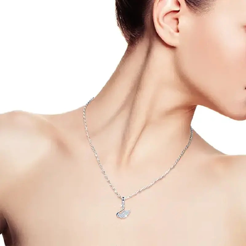 Swan Charm Necklace by Silphina