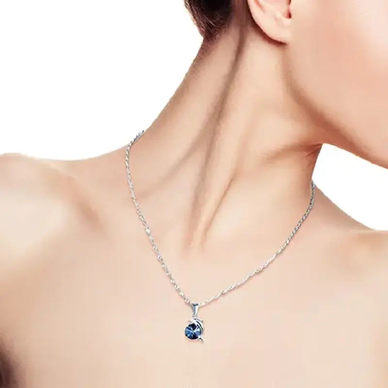 Blue Crystal Dolphin Necklace by Silphina