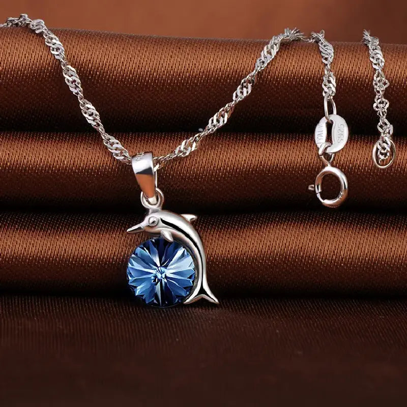 Blue Crystal Dolphin Necklace by Silphina