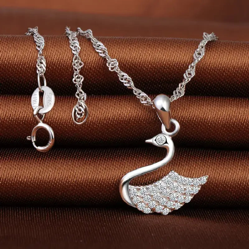 Swan Charm Necklace by Silphina